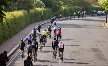 A high angle view of a group of cyclists touring Regent’s Park