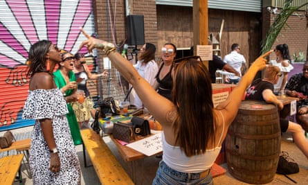 People party whilst staying in their “bubbles”, at a “UKG Brunch Presents: UKG Big BBQ “ event