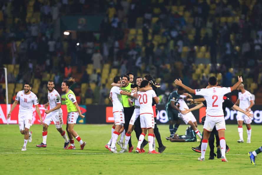 Tunisia’s players celebrate after winning.