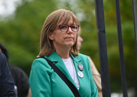 Lyra McKee’s sister Nichola Corner in green jacket