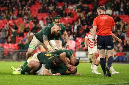 South Africa’s Wilco Louw celebrates scoring a try against Japan.
