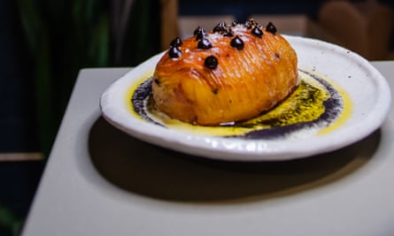 food in sauce on a plate in Another Hand in Manchester