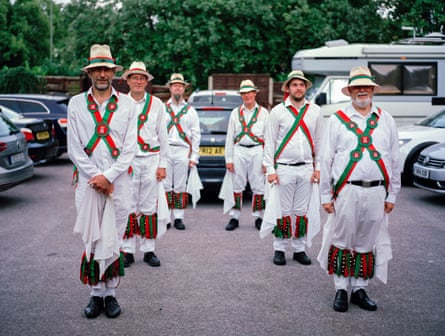 Winchester morris men pose for a photo in a pub car park in Hampshire