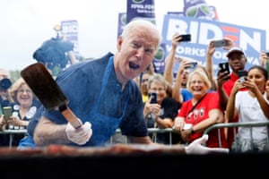 Democratic presidential candidate Joe Biden works the grill during the Polk county Democrats steak fry in Des Moines, Iowa, on 21 September 2019.