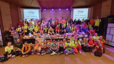 Members of Fareham running club with one of their hauls for Food Bank Run, which was started by the club’s welfare officer