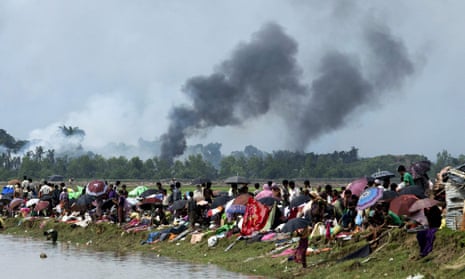 Smoke billows above what is believed to be a burning village in Rakhine state as Rohingya take shelter in a no-man’s land between Bangladesh and Myanmar.