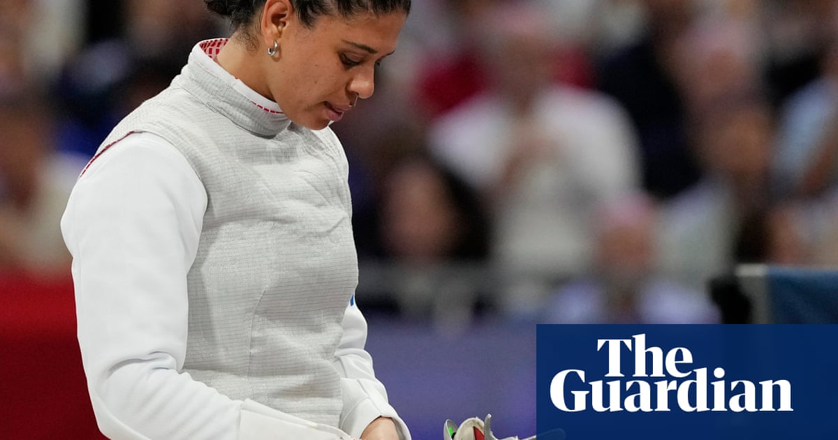 French fencer cleared of doping charge on account of kissing her partner