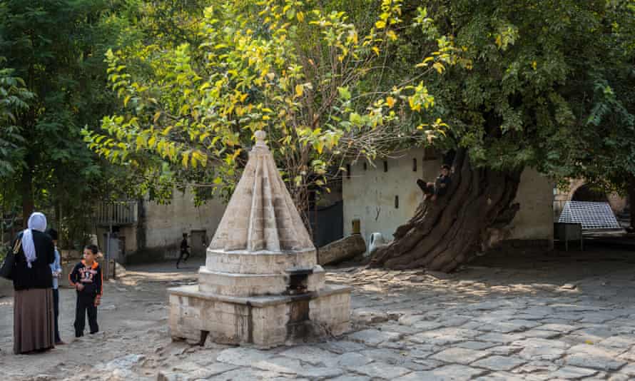 A Yazidi family at a shrine in Lalish