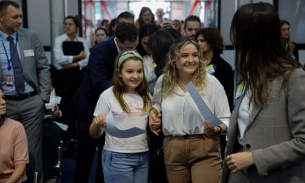 Mariana Agostinho, left,and her sister, Claudia, arrive at the European court of human rights.