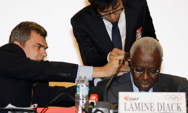 Nick Davies, left, confronted the then IAAF president, Lamine Diack, last December.