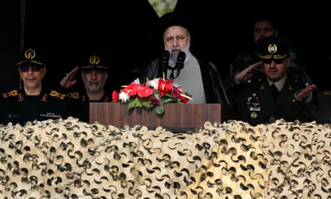 Iranian president Ebrahim Raisi speaks during the army day parade at a military base in northern Tehran, 17 April.