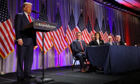 Donald Trump addresses House Republicans, as speaker Mike Johnson (center right), and conference chair Elise Stefanik (to his right), along with other party leaders, look on.