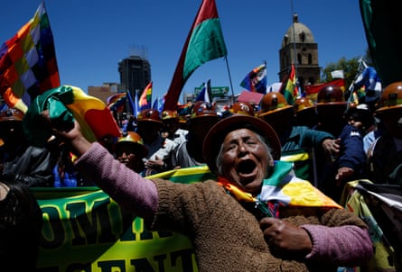A female supporter of Bolivian President Evo Morales shows her support during a march in La Paz, Bolivia, Wednesday, Oct. 23, 2019. Morales said Wednesday his opponents are trying to stage a coup against him as protests grow over a disputed election he claims he won outright, though a nearly finished vote count suggests it might head to a second round.