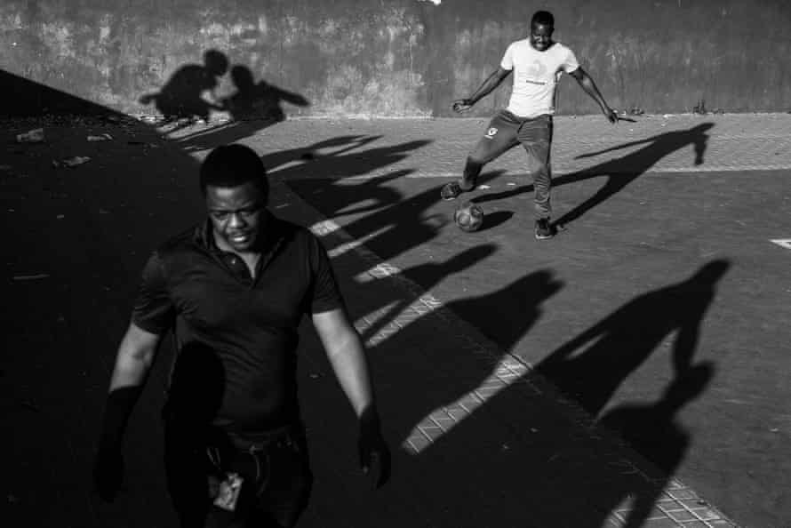 Ghost riders: the invisible lives of Johannesburg food couriers – photo essay | South Africa 30 On public holidays many drivers like to play football together