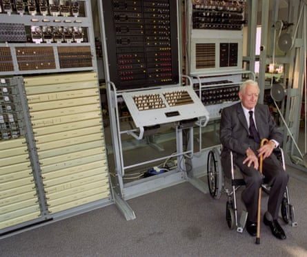 Tommy Flowers, a Post Office engineer who worked at Bletchley Park, England, in the 1940s and created the Colossus codebreaking machine, pictured, aged 90 with his rebuilt machine