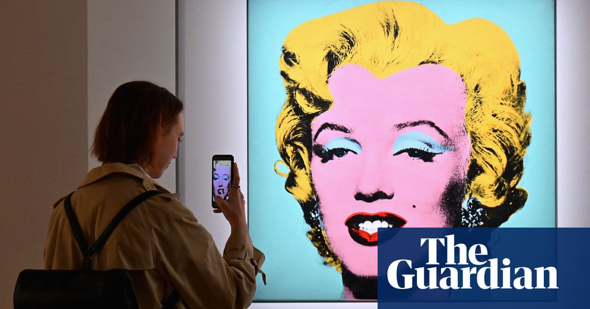 Andy Warhol’s famed Marilyn Monroe portrait sells for record $195m at auction