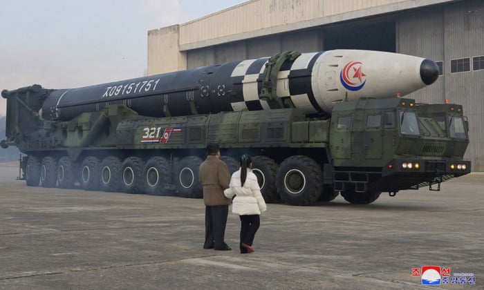 North Korean leader Kim Jong-un reveals daughter at ballistic missile test | North Korea | The Guardian
