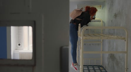 Unexpected feelings … one of the women who returned to Holloway takes a photograph in a cell.