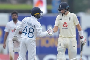 Sri Lanka’s Niroshan Dickwella congratulates Joe Root on his stupendous innings.