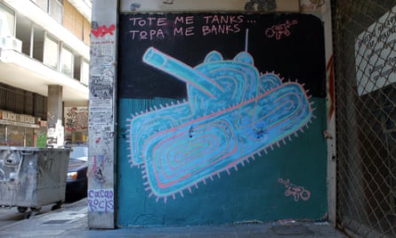 ‘Then they used tanks. Now they use banks’. Mural and photograph by Cacao Rocks