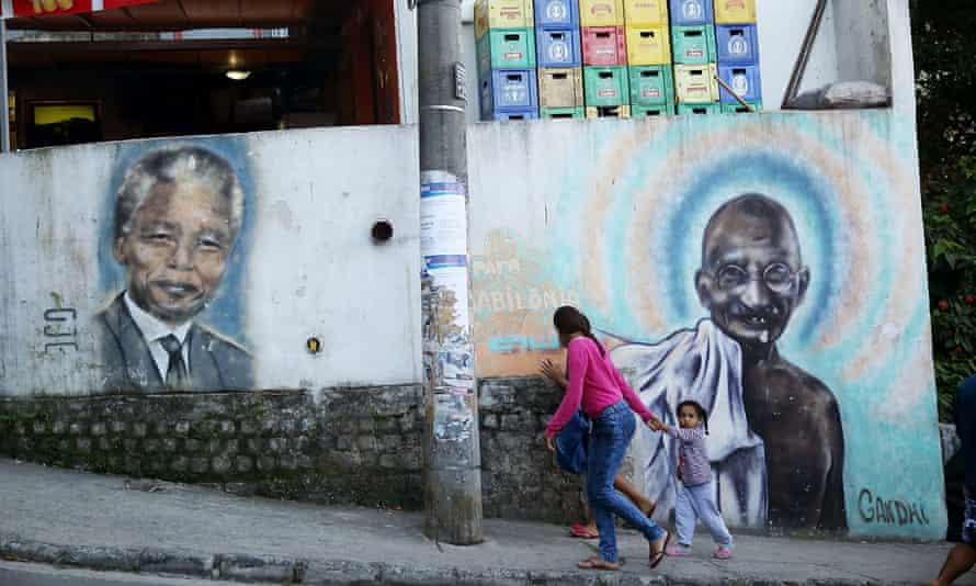 Tributes to Mandela and Gandhi on a wall of the Babilonia favela.