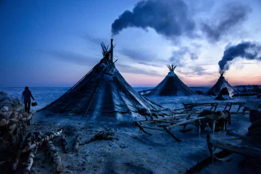 A colony of tents, or “chums”, belonging to Nenets herders stand in the Arctic tundra in the Russian Nenets Autonomous Region. The are the original people living in the Russian Arctic, before being crushed by Soviet collectivisation and affected by modern oil and gas exploration.