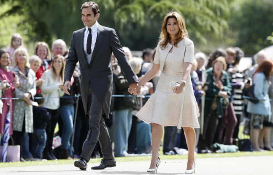 Roger Federer and his wife Mirka arrive at the church.