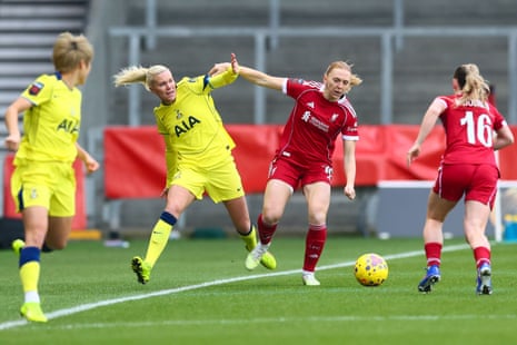 Josefine Rybrink gets pushed off the ball by Ceri Holland of Liverpool.