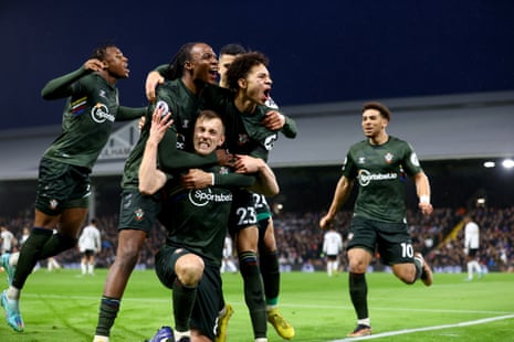 James Ward-Prowse (centre) is congratulated by his Southampton teammates after scoring from a free kick to make the score 1-1.
