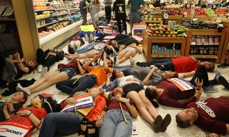 Protesters participate in a ‘die-in’ at a Publix supermarket in Coral Springs, Florida.