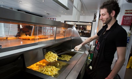 Alexi fries up chips.