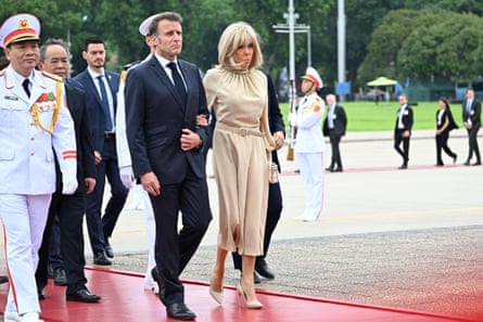 The Macrons take part in a wreath-laying ceremony at the Ho Chi Minh Mausoleum