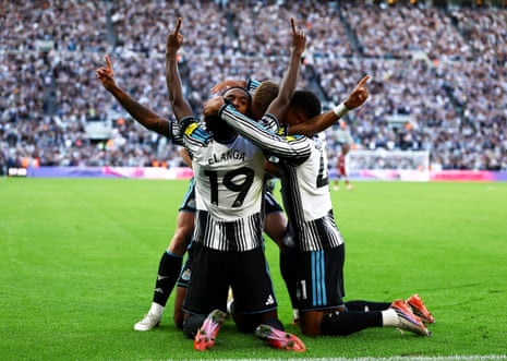 Willock celebrates scoring.