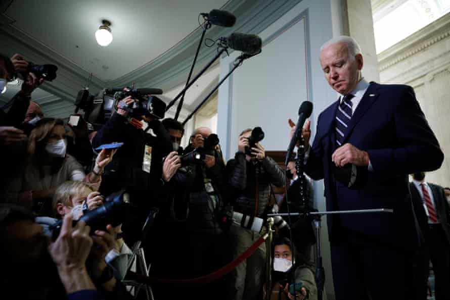Joe Biden talks to reporters after meeting with Senate Democrats on Capitol Hill.