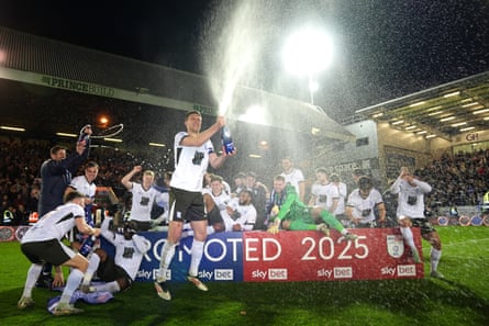 Birmingham City players celebrate promotion to the Championship