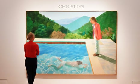 A woman looks at Portrait of an Artist (Pool with Two Figures) at a press preview.