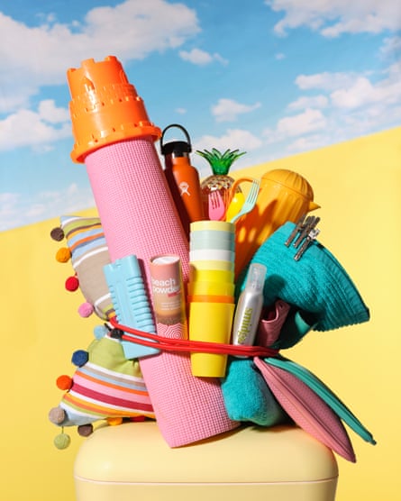 The outdoors kit: (from left) Beach Powder for removing sand, a Hydro Flask for hot or cold food and drinks, Smidge bug repellent, Pincinox stainless steel pegs