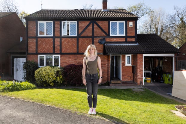 Meghan Beesley, a Team GB Olympian, standing outside the Capes house, which she bought