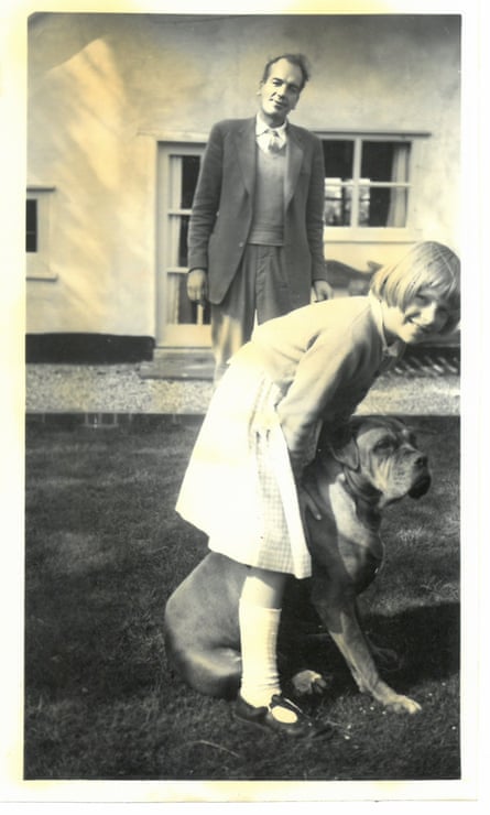 Polly Toynbee outside a cottage in Suffolk with her father, Philip, and a dog.
