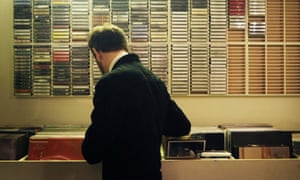 A man browses the racks of vinyl at Posh Isolation, Copenhagen