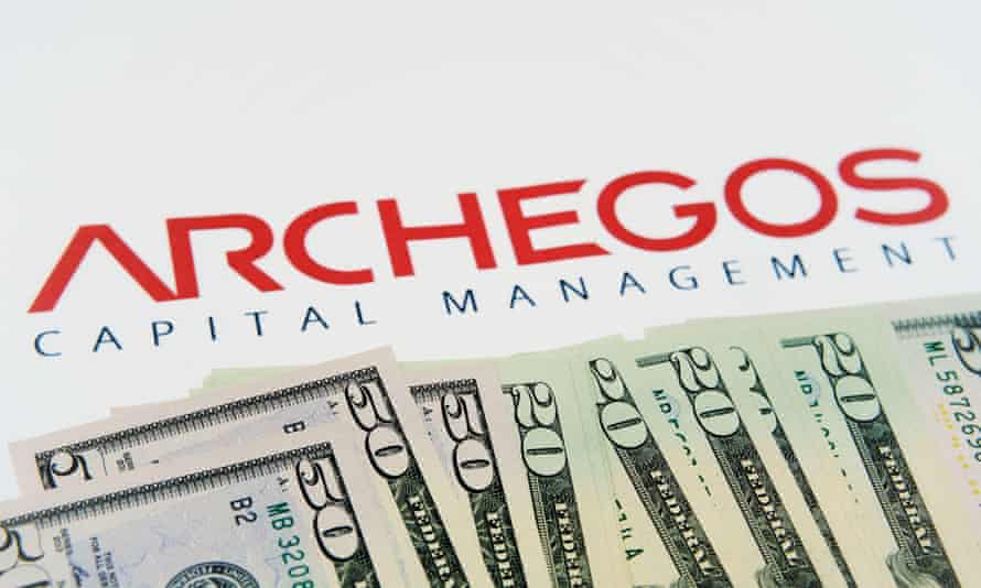 Archegos logo on a pile of US banknotes