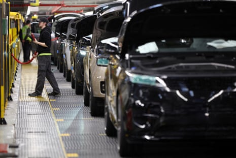 A member of staff works on the production line at Jaguar Land Rover’s factory in Solihull, Britain, December 15, 2022.