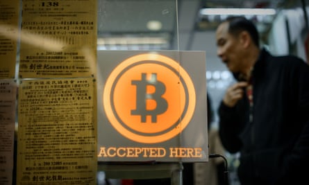 A shop displays the bitcoin sign during the opening of the first bitcoin retail shop in Hong Kong last year.