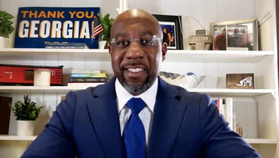Rev Raphael Warnock speaks via his YouTube channel as votes continue to be counted in Atlanta, Georgia early Wednesday.