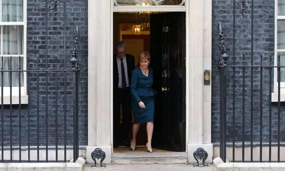 Scottish First Minister Nicola Sturgeon and Scottish Brexit minister Michael Russell leave No 10 Downing Street.