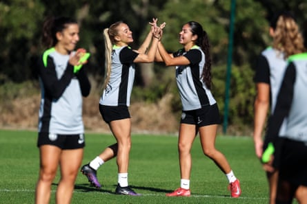 Ria Bose (centre left) during training with Sporting