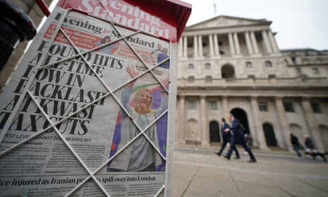 London's Evening Standard newspaper, with the headline "Pound hits all-time low in backlash at Kwasi tax cuts" on display outside the Bank of England