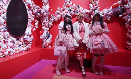 Actinidia on Instagram: Influencers pose with Hello Kitty displays.