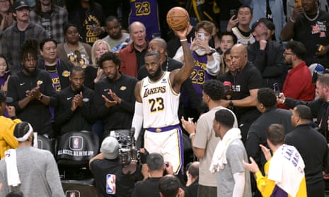 Los Angeles Lakers forward LeBron James acknowledges the crowd after scoring his 40,000th career point against the Denver Nuggets at Crypto.com Arena on Saturday night.