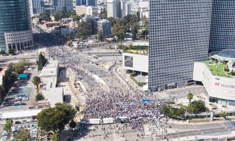 Thousands of protesters block a main road in Tel Aviv during a ‘day of disruption’ on 1 March.